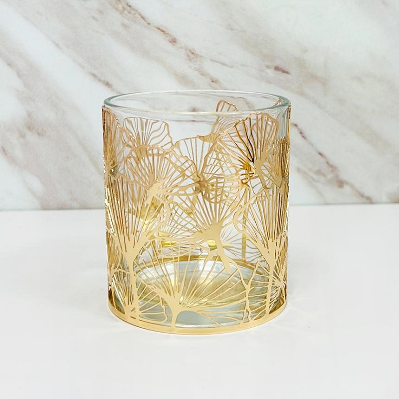 The elegant home's gilded ginkgo glass candlestick has launched, illuminating a new realm of home aesthetics.
